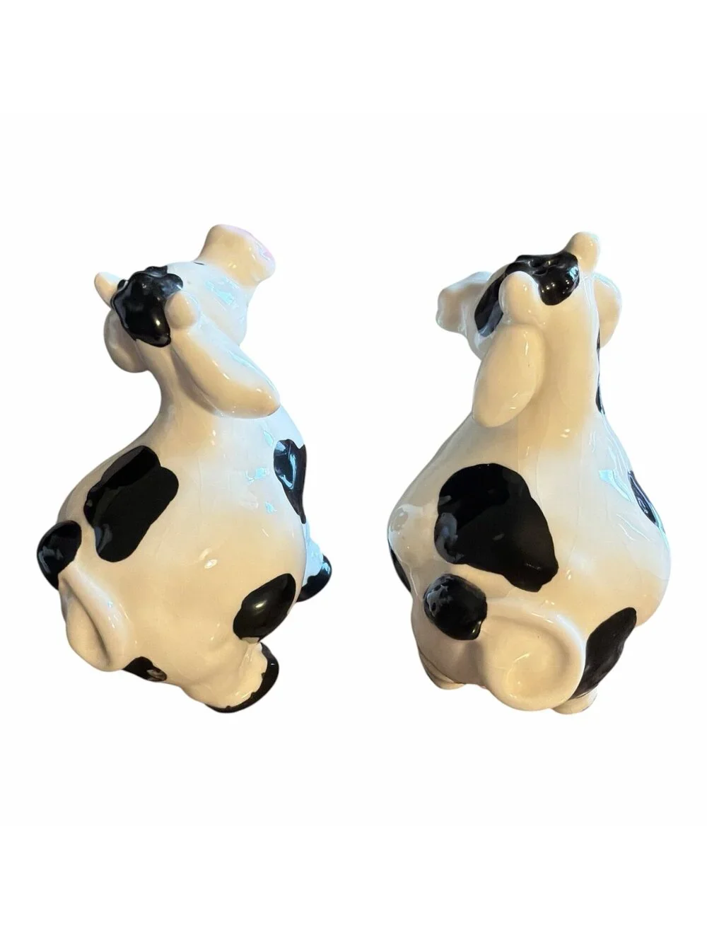 Salt and pepper cow shakers